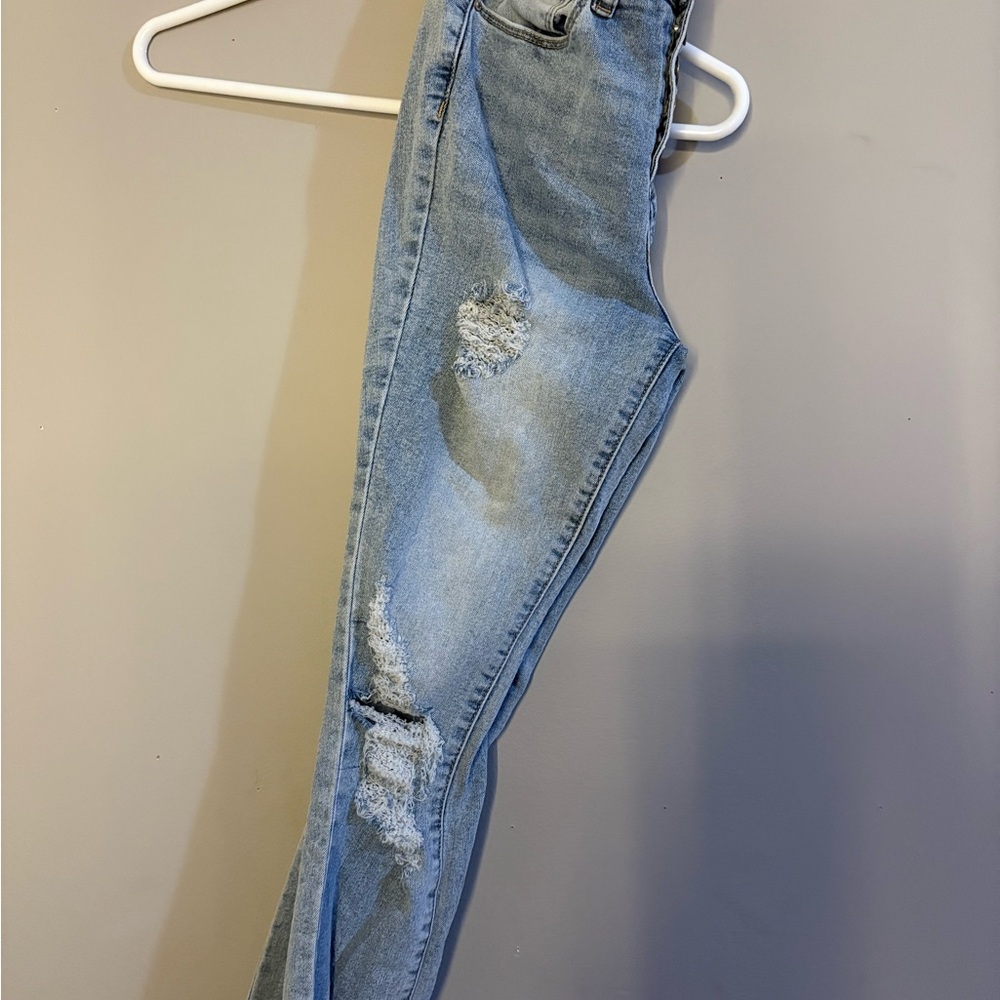 Women's Distressed Blue Jeans